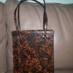 Nice! Patent leather faux tortoise shell shoulde…